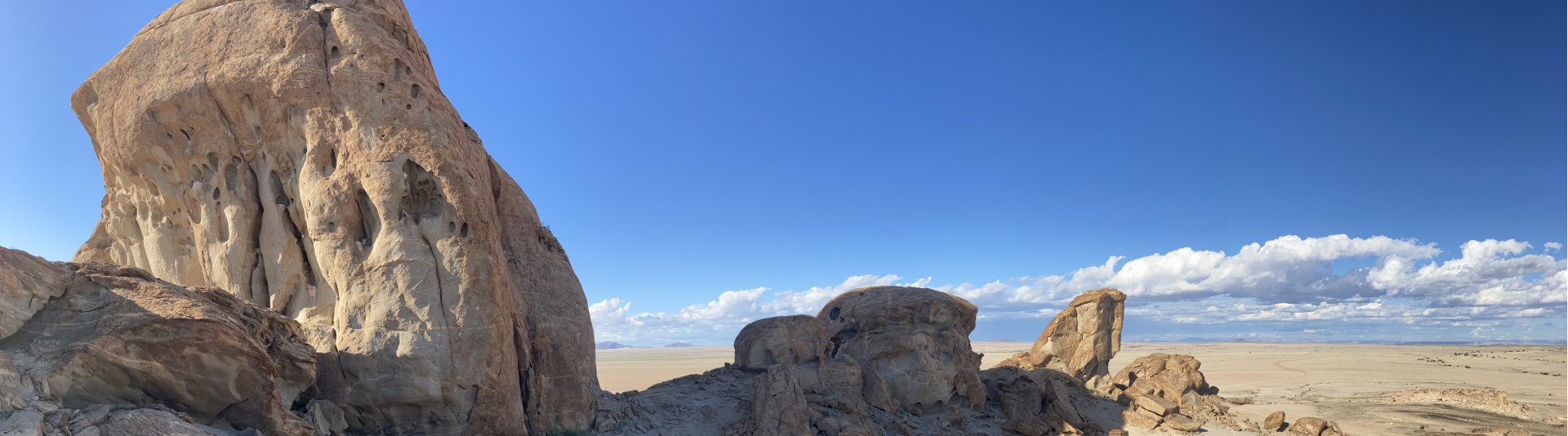 bushbundu-car-rental-windhoek-namibia-rock-formation-in-the-desert-travel-blog-cover-image