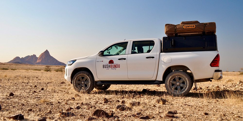 bushbundu-car-rental-windhoek-namibia-toyota-hilux-on-the-spitzkoppe-scenery